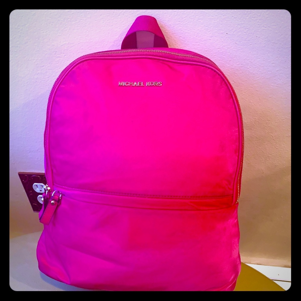Pink Micheal Kors book bag